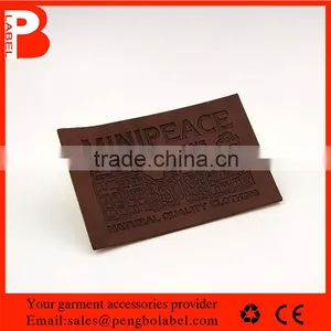 Custom Embossed Brown Denim Leather Patch With Embroidery Logo thumbnail-1