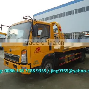 HOWO 3800mm Wheelbase Cheap Wrecker Tow Truck, L5600*W2300 Flatbed Wrecker Towing Truck on Sale in Africa thumbnail-1