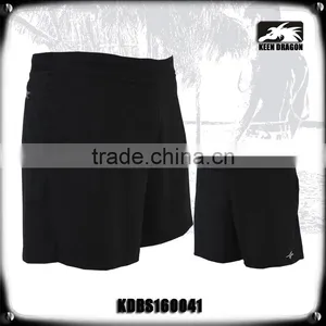 NEW CUSTOM DESIGN PLAIN BLACK MMA SHORTS WITH WATERPROOF ZEPPERS thumbnail-1