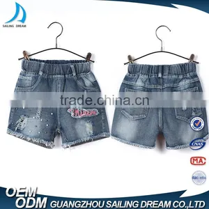 China Apparel Factory Elastic Ribbon Waistband Kids Printed Shorts Jeans With Hole thumbnail-1