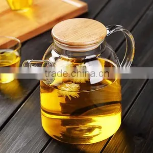 Made in China Glass Teapot Kettle With Measurement Scale Wooden Lid Handmade thumbnail-4