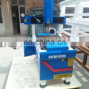 SKM-6090 Whole Cast Iron Body Metal Coin Engraving Machine thumbnail-4