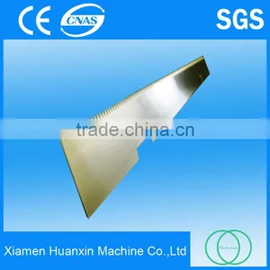 Packaging Machine Using Serrated Cutting Blades thumbnail-1