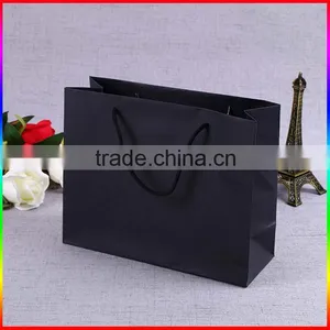 Custom Made Free Design Popular Black Kraft Paper Carry Bag With Logo Printing thumbnail-1