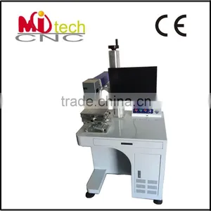 High Speed 20w Fiber Mobile Phone Case Laser Marking Machine thumbnail-1