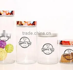 Round Glass Storage Jar With Decal and Metal Lid thumbnail-3