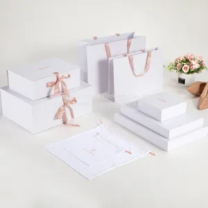 Custom Luxury White Magnet Flap Clothing Paper Box Foldable Magnetic Closure Gift Boxes With Black Ribbon thumbnail-3