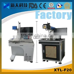 Fiber Laser Marking Machine for Calculator Buttons thumbnail-1