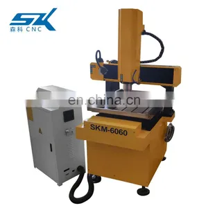 Professional Stable-body CNC Router Engraving Metal Carving Mini Iron Sheet Plate Engraving Machine thumbnail-2