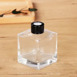 Wholesale Flameless Aroma 50ml Flower Glass Reed Diffuser Square Bottle 100ml Square Reed Diffuser With Wooden Bamboo Lids thumbnail-5