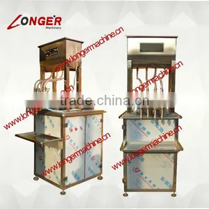 Four Head Paste Filling Machine|Small Drink Filling Machine thumbnail-1