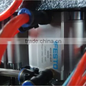 Automatic Lineal PET Blow Moulding Machine thumbnail-1