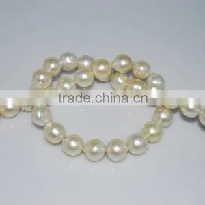 Grade A 12-13mm White Round South Sea Pearl Strands thumbnail-1