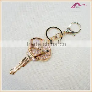 Cheap Custom Gold Crystal Key Shape Car Logo Keychain thumbnail-1