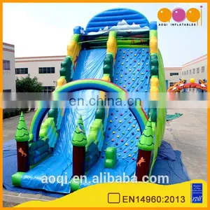 AOQI New Style Rainbow Forest Outdoor Inflatable High Slide With Inflatable Rock Climbing Wall for Adults thumbnail-1
