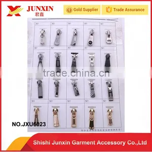 Professional China Manufacturer Customized Logo Metal Zipper Puller Slider thumbnail-1