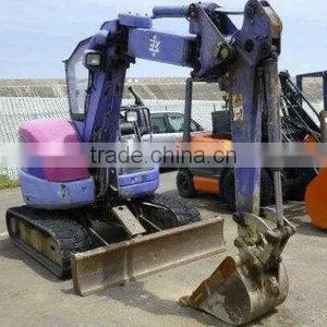 Бывший экскаватор с обратной лопатой KOMATSU thumbnail-1