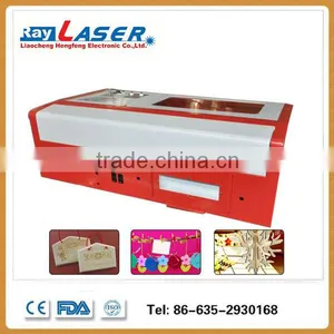 China Embroidery Laser Cutting Machine/laser Drawing Machine/mini Laser Engraving Machine thumbnail-5