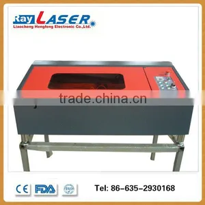 Low Cost Acrylic Trade Assurance Co2 Laser Engraving Cutting Machine for Wood Leather thumbnail-1