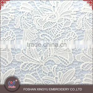 Guangzhou Factory Supply Embroidered Moisture and Cool White Cutwork Embroidery Fabric for Dress thumbnail-1