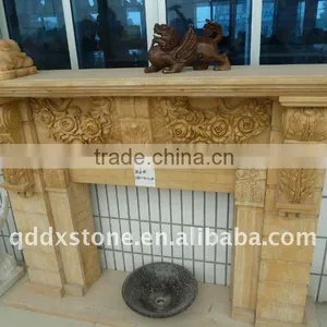 Yellow Scupltured Stone Fireplace Surround thumbnail-1