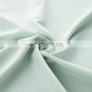 High Quality 100D Polyester 4 Way Stretch Fabric Plain Woven Polyester Spandex Fabric Fashion Textile Material thumbnail-4