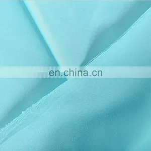 Chinese Popular Colorful Microfiber Polyester Peach Skin Fabric Soft Shell Best Clothing Fabric for Beach Shorts, Garment thumbnail-3