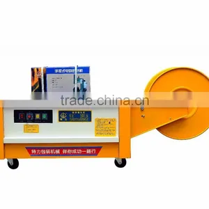 Low Table Semi-automatic Strapping Machine for Carton Packing thumbnail-1