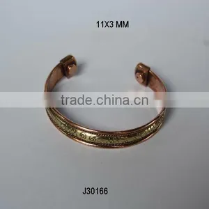 Magnetic Copper Bracelet With Patterns on Brass Center Wearing it Has Health Benefits thumbnail-1
