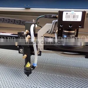 Guangzhou Factory Fast Speed Actualmatic Laser Leather Fabric Cutting Machine thumbnail-2