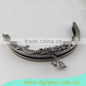Gunmetal Round Shape Frame With Flower Carved Pattern and Flower Kiss Lock thumbnail-1