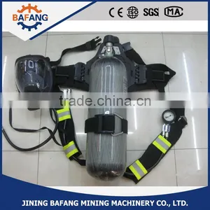 Fireman Wearing Self-contained Air Breathing Apparatus thumbnail-1