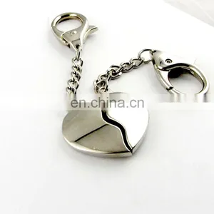 Polished Nickel Key Shape Keychain thumbnail-2