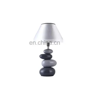 Wholesale Cumulate Stone Shape Ceramic Base Modern Nordic Nightstand Lamps for Hotel Bedside thumbnail-1
