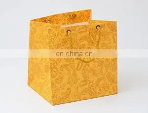 Beautiful and Multiwork Base Unique Yellow Colour PREMIUM GIFT PAPER CARRY BAGS-GOLD PRINT Designing Hand Clutch Paper Bag . thumbnail-1