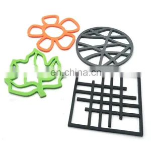 Creative Hollow Silicone Placemat With Geometry , Leaves and Flowers Shape for Non-slip, High Temperature and Heat Insulation thumbnail-1