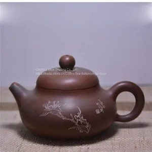 Flower Hand Carving Tea Pot With Ceramic Side Handle thumbnail-1