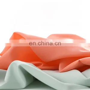 High Quality 100D Polyester 4 Way Stretch Fabric Plain Woven Polyester Spandex Fabric Fashion Textile Material thumbnail-1