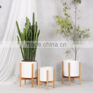 Walnut Stand With Smooth Matte Pot Fibreglass Planter Pot thumbnail-1