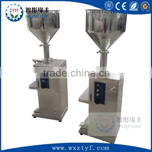 Small Glass Bottle Filling Machine thumbnail-1