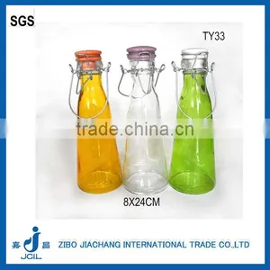 Nice Cheap Colored Cylinder Spraying Glass Bottle With Ceramic Clip Lid thumbnail-1