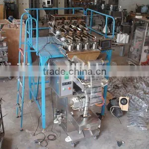 Automatic Granule Packing Machine( With 4 Heads Weighter) thumbnail-1