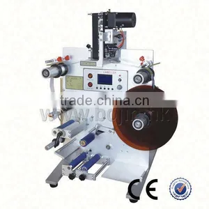 Double-sided Round Bottle Labeling Machine thumbnail-1