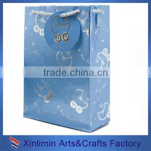Blue Gift Paper Bags With a Silk Bow for Shopping thumbnail-1