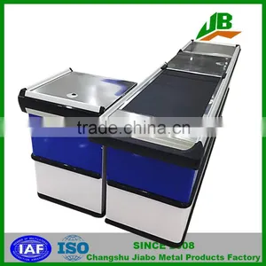 Checkout Counter With Conveyor Belt Used in Supermarket thumbnail-1