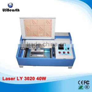 2015 New Version 40W LY 3020 CO2 Digital Laser Engraving Cutting Machine With Digital Function With Drag Chain Design thumbnail-1