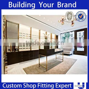 Simple Style White Wall Mouted Sunglasses Optical Store Design thumbnail-2