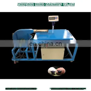 Automatic Weighting Two Pipes Pillow Cover Stuffing Machine thumbnail-1