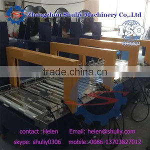 Semi-Automatic Carton Tying Strapping Machine/packing Machine for Carton Box thumbnail-1