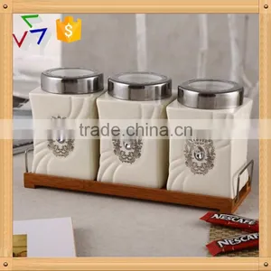 Ceramic Canister Set With Stainless Lid & Wooden Stand thumbnail-1